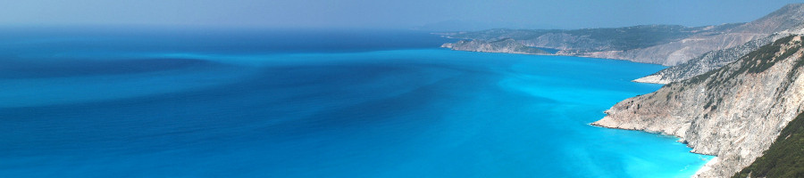 Myrtos bay with its white cliffs and the peninsula of Assos