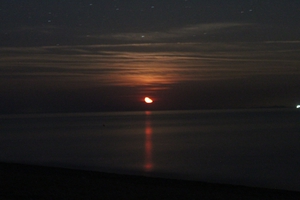 Moonrise over a summer's night sea