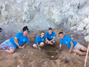 Team smile after finding sea turtle eggs